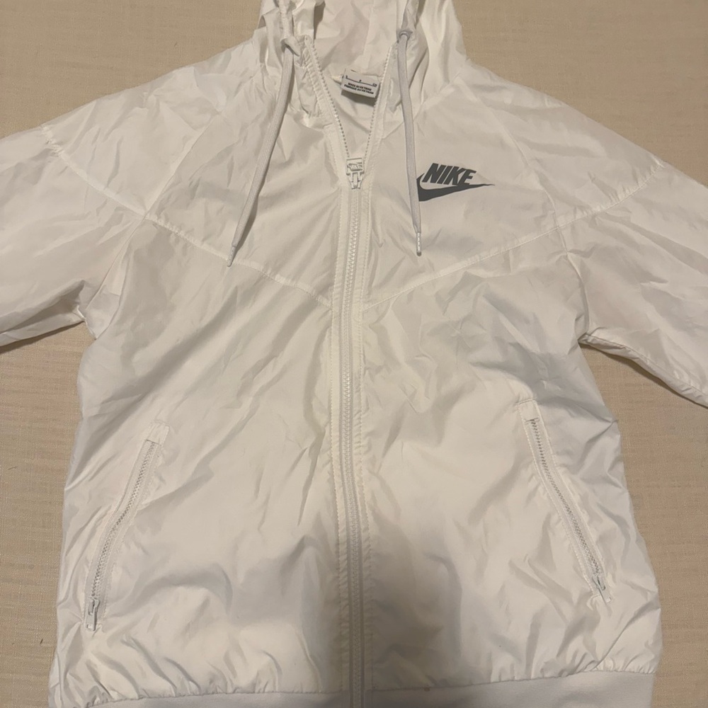 Woman’s small Nike white windbreaker